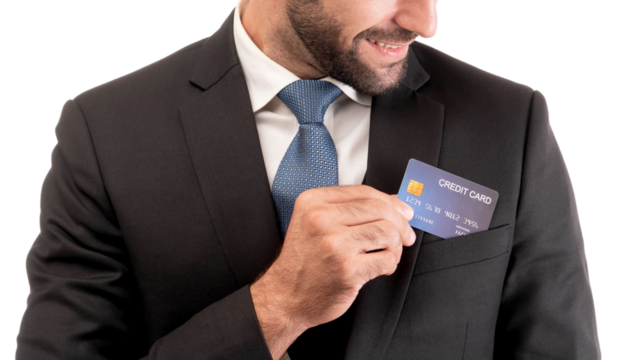 Close-up of a confident businessman in a formal suit and tie holding a credit card, representing financial success, banking, and corporate professionalism, isolated on a transparent background