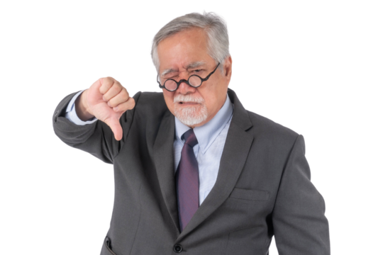 Senior businessman in a suit with a disappointed expression, showing a thumbs-down gesture, isolated on a transparent background - concept of disapproval, failure, and criticism