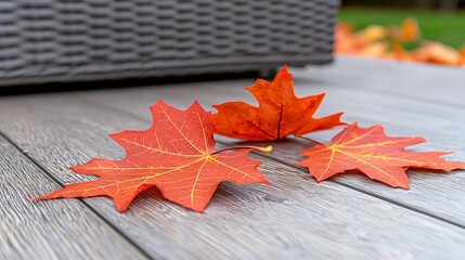 Obraz premium Autumn Leaves on Wooden Deck