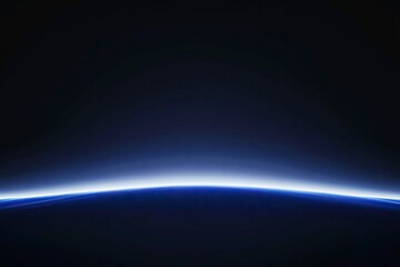 Abstract blue glowing light with a gradient from dark to bright on a black background, a planet Earth horizon line, and a space background for design and decoration in space themes,