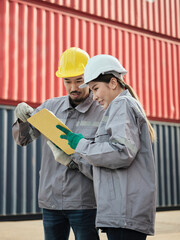 Engineer team discuss problems and taking a note sharing idea