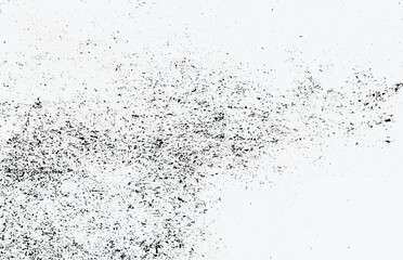 Black grunge speckled texture on a white background, perfect for overlays, designs, and vintage effects.