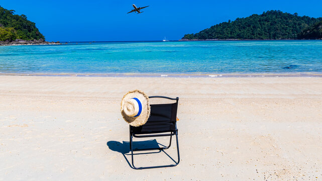 Travel concept with sea beach chairs in summer vacation