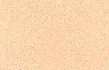 Abstract light beige background with fine grain texture, perfect for design projects and backdrops.