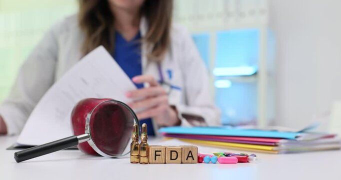 A healthcare professional reviews FDA medical papers and uses tools effectively in clinical patient care