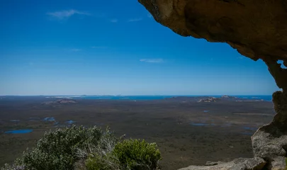 View over the plains of Cape Le Grand National Park and the Great Australian Bight from  cave at Frenchman Peak, Western Australia