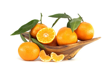Fresh Mandarins in Wooden Bowl with Leaves and Juicy Slices