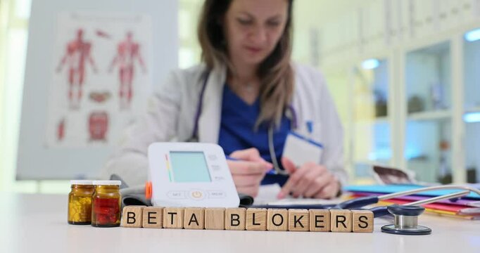 A skilled medical professional studies beta blockers, highlighting advancements in modern healthcare