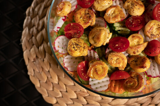 Healthy Chicken Salad with Tomatoes and Radish – A Fresh & Nutritious DelightA high-quality, appetizing image of a healthy chicken salad featuring tender grilled chicken pieces, vibrant cherry tomatoe