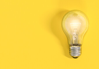 Light bulb on yellow background, creative ideas concept