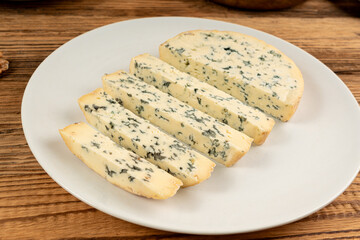 Fourme cheese, stinky french cheese, Fourme d'Ambert gourmet food, semi-hard blue cheese
