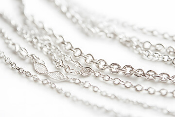 Obraz premium Collection design of seamless metal chains colored silver shine or Stainless steel on white background. Body decorations make people beautiful and attractive to opposite sex.