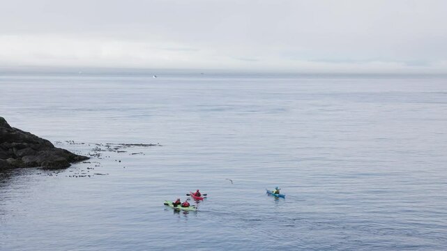Kayaks on the ocean, sunny day, Sooke BC, relaxing ocean scene. 4K 24FPS.