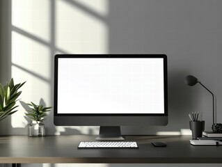 Fototapeta premium Digital Workspace: A sleek and modern workspace features a desktop computer with a blank screen. Shadows dance across the gray wall, complementing the minimalist design.
