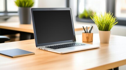 Fototapeta premium Modern Office Layout with Laptop, Green Plants, and Minimalist Design Elements for Feng Shui