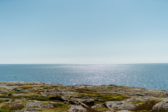 Sparkling blue sea and granite rocky coast in Frilles&aring;s, Halland, Sweden