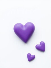 Obraz premium Charming purple hearts arranged in a beautiful pattern on a clean white background for design