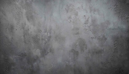 Fototapeta premium The image shows a dark grunge concrete wall with a textured surface, an aged concrete floor, and a vintage industrial feel