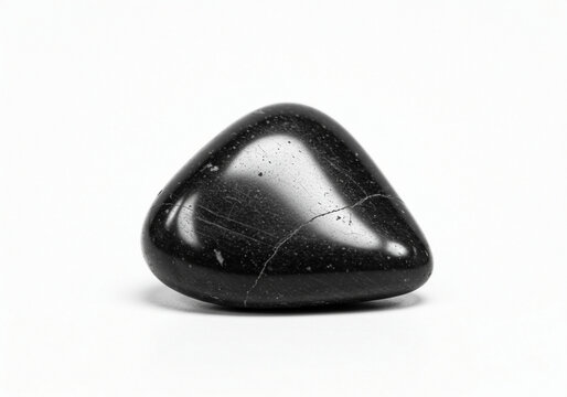 Polished Black Obsidian Stone on White Background for Mineralogy Study