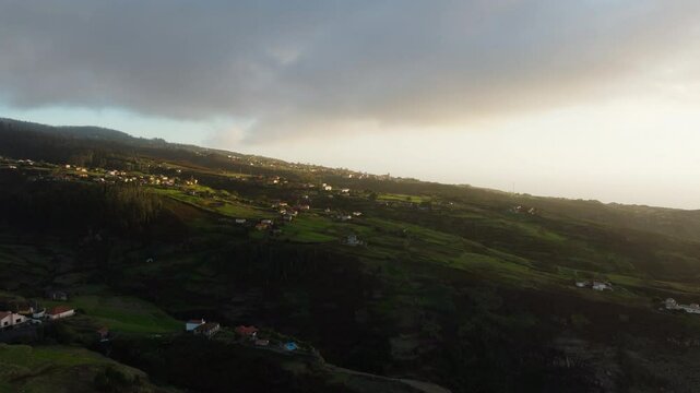 Aerial drone village of Ponta do Pargo in golden sunset light, Madeira island, Portugal