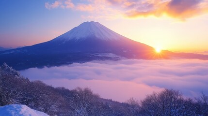 Majestic Snowy Mountain Sunrise Over a Sea of Clouds