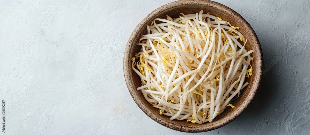 Poster fresh bean sprouts arranged neatly in a brown bowl on a light textured background highlighting their