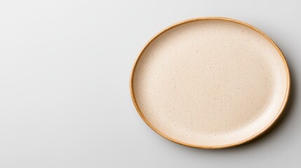 A minimalist beige serving plate placed on a clean white background perfect for stylish table settings and decor
