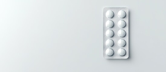 Empty tablet blister pack with white circular tablets on a light gray background positioned to the right with ample copy space for healthcare concepts
