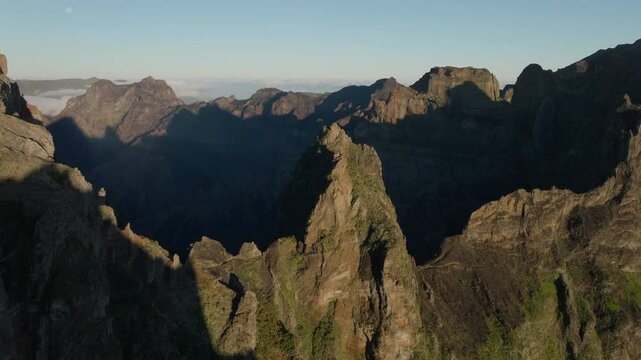 Rugged mountain ridge, trail from Pico do Areeiro to Pico Ruivo, Madeira, Aerial Drone