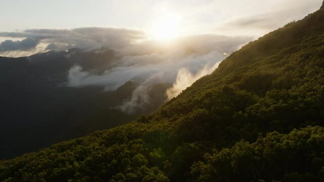 Amazing sunrise over the mountains of Madeira, from Bica da Cana, aerial drone