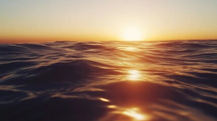 Obraz premium Serene Sunset Over Gentle Ocean Waves Illuminated by Soft Warm Light and Tranquil Reflections Under a Colorful Sky