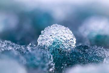 Quartz on green blue chalcedony (known as blue grape agate). Specimen from Indonesia. macro photography detail texture background. close-up mineral crystal unpolished semi-precious gemstone