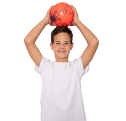 Young boy holding a ball over head standing isolated over transparent background. PNG transparent