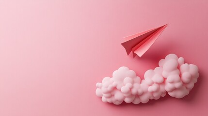 A pink paper airplane flies above fluffy clouds on a soft pink background, creating a whimsical and dreamy atmosphere.