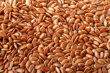 Brown flax seeds background texture