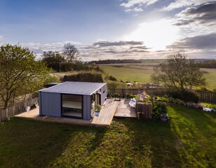modern tiny house with a garden and a small backyard