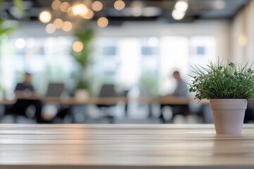 Blurred office setting with people engaged in a business meeting, discussing strategies around the table