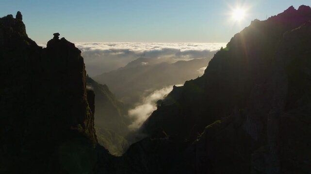 Rugged mountain ridge, trail from Pico do Areeiro to Pico Ruivo, Madeira, Aerial Drone