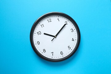 Big beautiful stylish clock on color background