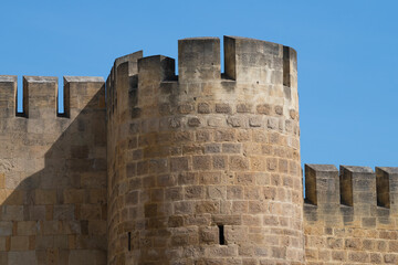Fragment of defensive walls with the turret of the ancient fortress of Naryn-Kala on a sunny day. Derbent, Russia © sikaraha