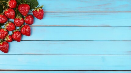 Strawberries displayed on blue wood. A bright, inviting header for recipes and food blog posts