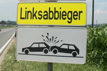 Direction sign in road traffic