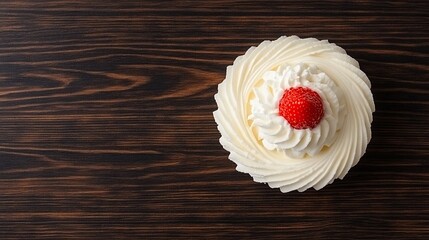 Top-down cake with cream & berry on wood. Space left for text. Food blog, card, or invite use