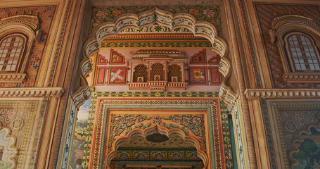 Obraz premium Jaipur, Rajasthan, India. Patrika Gate at Jawahar Circle. Interior inside, many Colorful ornament patterns on old walls. old Pink city