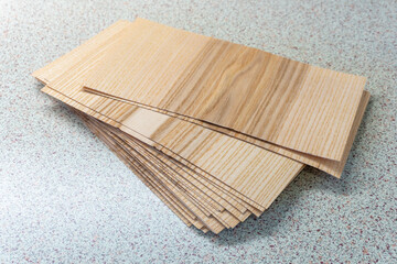 Rectangular Veneer Sheets on Black Background