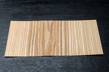 Rectangular Veneer Sheets on Black Background