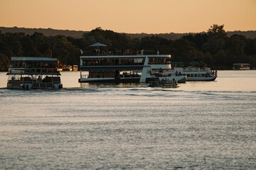 Tourists enjoying a cruise on the Zambezi River in Zimbabwe