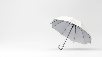 Elegant white umbrella on minimalist background with soft shadows