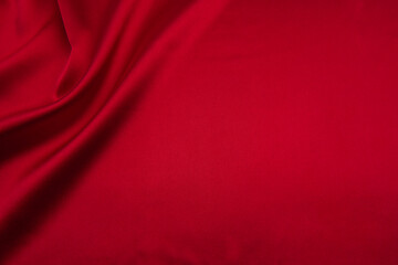 red satin or silk fabric as background