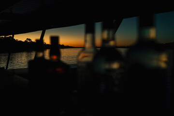 View of the Zambezi River from a tourist boat through bottles, Zimbabwe